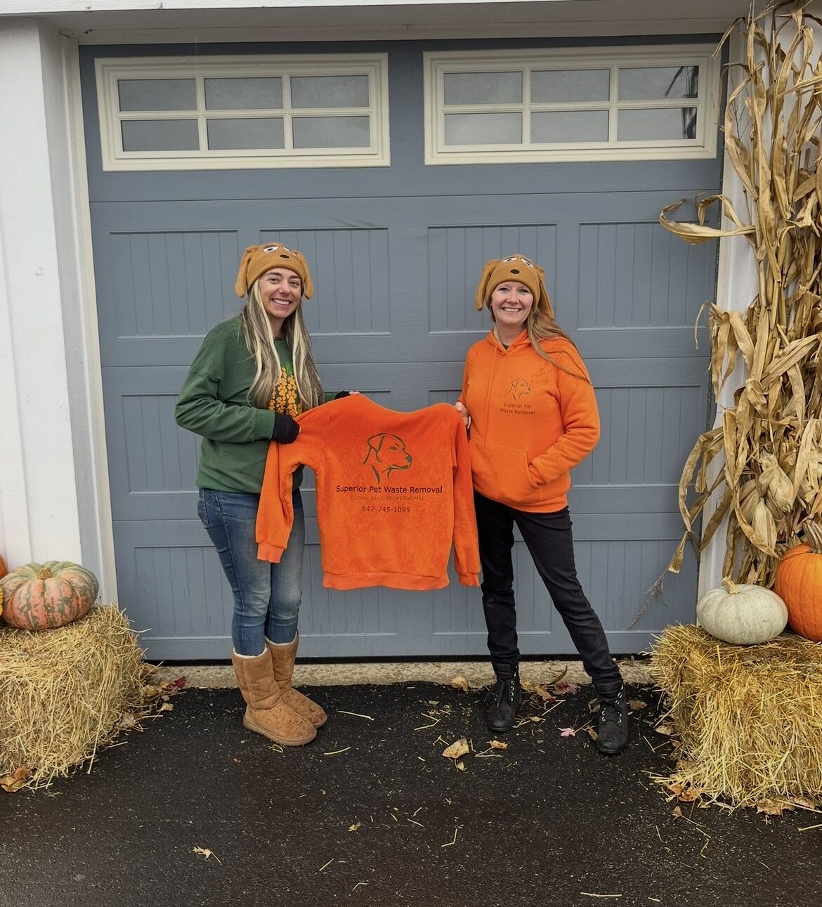 Lauren and Michelle with branded hoodie